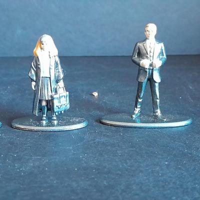 Harry Potter Sticker books and small metal figures and two keychains