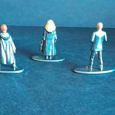 Harry Potter Sticker books and small metal figures and two keychains