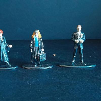 Harry Potter Sticker books and small metal figures and two keychains