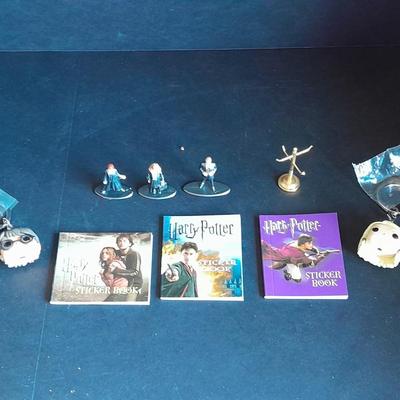 Harry Potter Sticker books and small metal figures and two keychains
