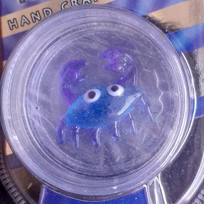 Digimon pillow Keychains and a Looking glass limited edition torch Sculpture True blue crab