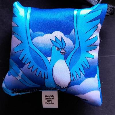 Digimon pillow Keychains and a Looking glass limited edition torch Sculpture True blue crab