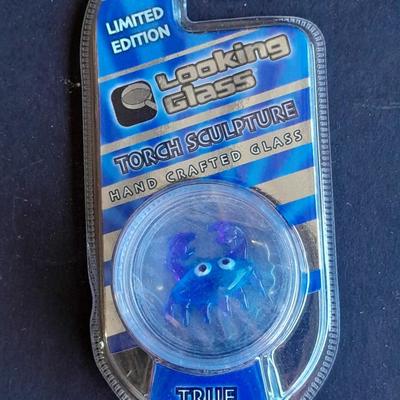 Digimon pillow Keychains and a Looking glass limited edition torch Sculpture True blue crab