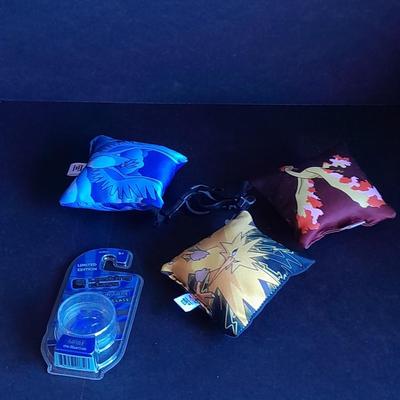 Digimon pillow Keychains and a Looking glass limited edition torch Sculpture True blue crab
