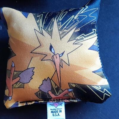 Digimon pillow Keychains and a Looking glass limited edition torch Sculpture True blue crab