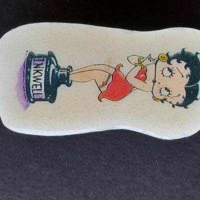 Signed Betty Boop pin and a Betty Boop zip up makeup / pencil bag