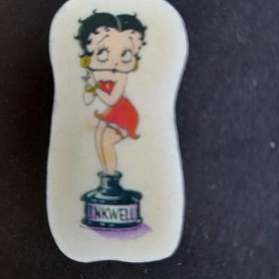 Signed Betty Boop pin and a Betty Boop zip up makeup / pencil bag