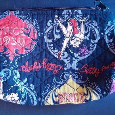 Signed Betty Boop pin and a Betty Boop zip up makeup / pencil bag