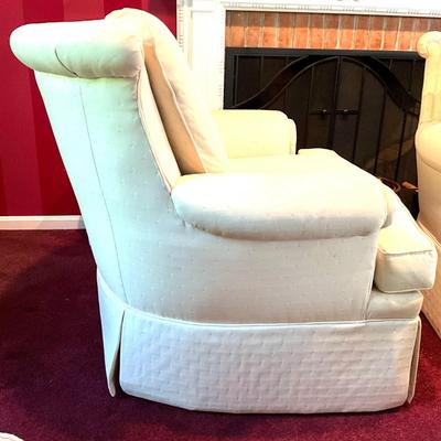 354 Pair of Off White Jessica Charles Swivel Rocking Arm Chairs with Storage Ottomans