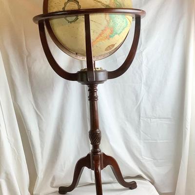 Lot 422. Replogle 16â€ Globe on Mahogany/Brass Stand