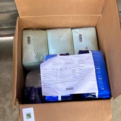 Lot of medical items, wheelchair feet, adult diapers