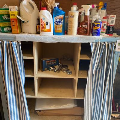 Vintage cabinet with household supplies