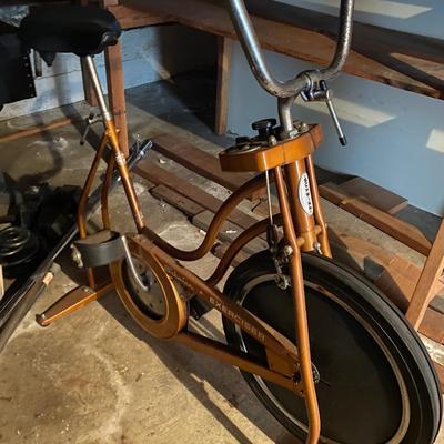 Weightlifting bench, vintage Schwinn Exerciser, and  more