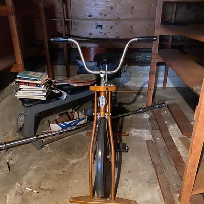 Weightlifting bench, vintage Schwinn Exerciser, and  more