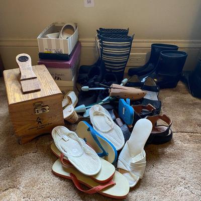 Collection of shoes and vintage shoe shining kit