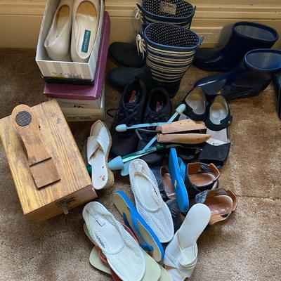 Collection of shoes and vintage shoe shining kit