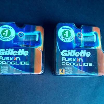 Two new packages 4 cartridges each Gillette Fusion Pro-glide Razor cartridges