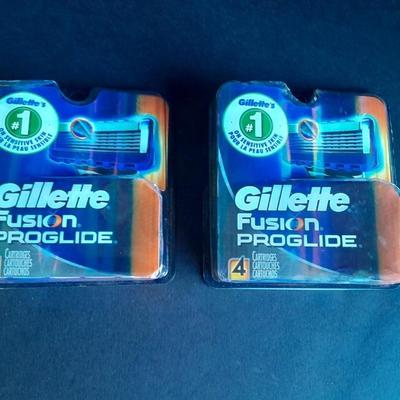 Two new packages 4 cartridges each Gillette Fusion Pro-glide Razor cartridges