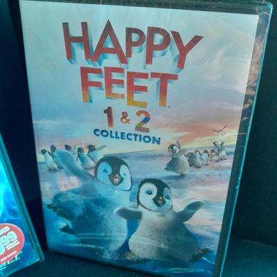 Children's Movies on DVD Happy feet 1 & 2, Walking with Dinosaurs, Merry Madagascar, and more