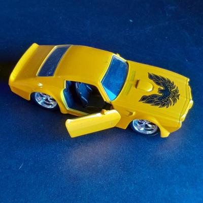 Two Die Cast Cars, Volkswagen Beetle and 1972 Pontiac Firebird