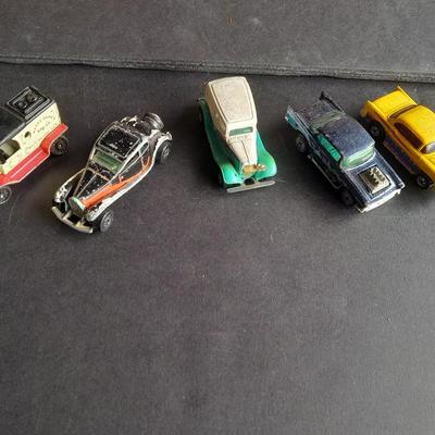 Tomy Tomica car with 4 Hot Wheels