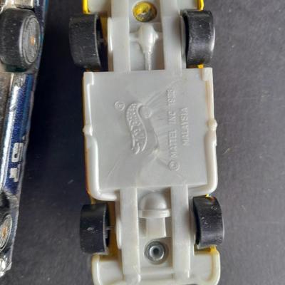 Tomy Tomica car with 4 Hot Wheels
