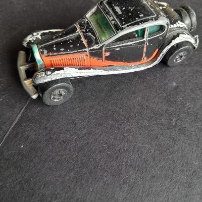 Tomy Tomica car with 4 Hot Wheels