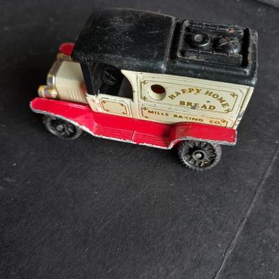Tomy Tomica car with 4 Hot Wheels