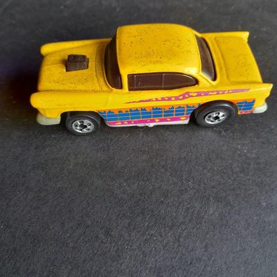 Tomy Tomica car with 4 Hot Wheels