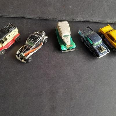 Tomy Tomica car with 4 Hot Wheels