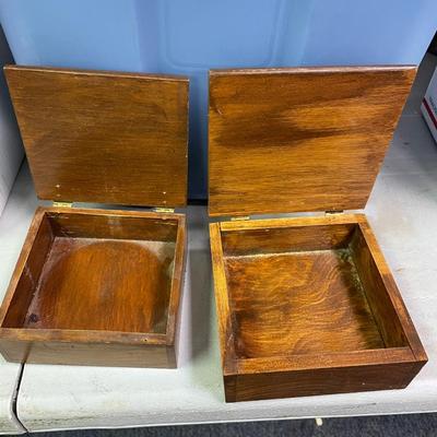 2 small wooden boxes