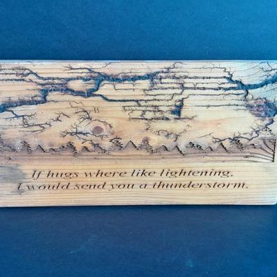 Two wall hangings with Fracted wood design "If hugs were like Lightning, I would send you a Thunderstorm, and mountain scene