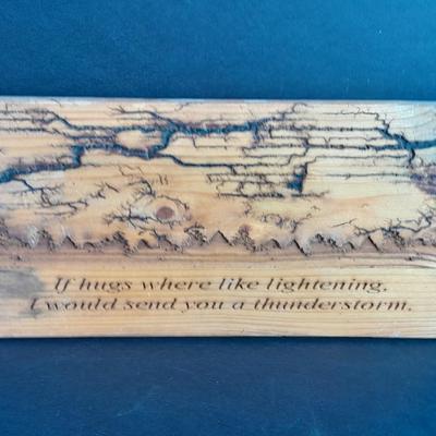 Two wall hangings with Fracted wood design "If hugs were like Lightning, I would send you a Thunderstorm, and mountain scene