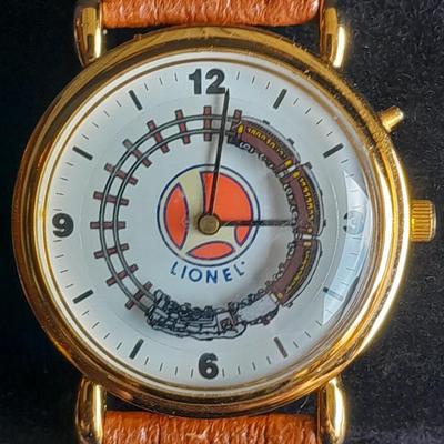 Vintage Lionel Collectible Trains Wristwatch with Brown Leather band has a Moving Train!! complete with Tin
