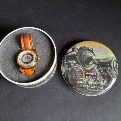 Vintage Lionel Collectible Trains Wristwatch with Brown Leather band has a Moving Train!! complete with Tin