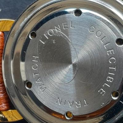 Vintage Lionel Collectible Trains Wristwatch with Brown Leather band has a Moving Train!! complete with Tin