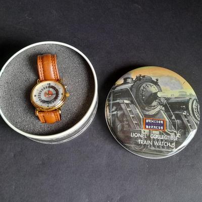 Vintage Lionel Collectible Trains Wristwatch with Brown Leather band has a Moving Train!! complete with Tin