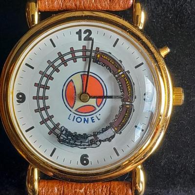 Vintage Lionel Collectible Trains Wristwatch with Brown Leather band has a Moving Train!! complete with Tin