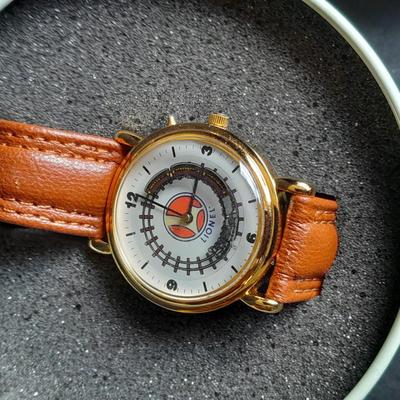 Vintage Lionel Collectible Trains Wristwatch with Brown Leather band has a Moving Train!! complete with Tin
