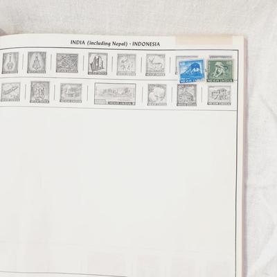 POSTAGE STAMP ALBUM - WITH STAMPS