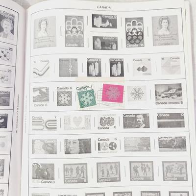POSTAGE STAMP ALBUM - WITH STAMPS