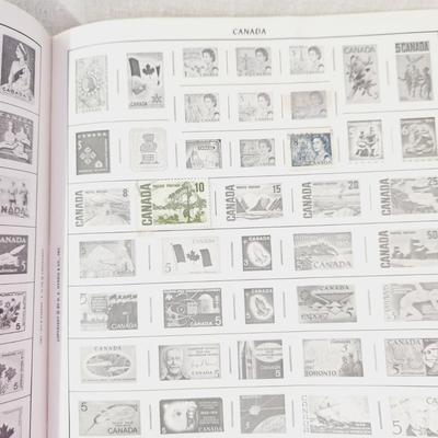 POSTAGE STAMP ALBUM - WITH STAMPS