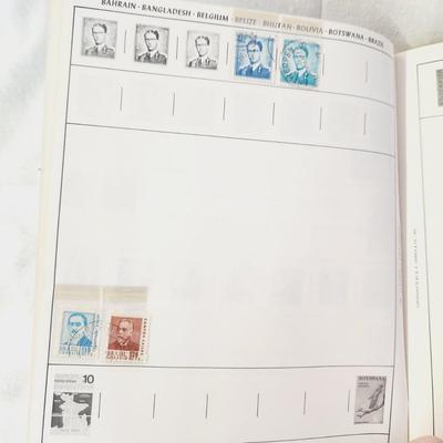 POSTAGE STAMP ALBUM - WITH STAMPS