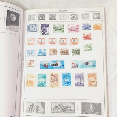 POSTAGE STAMP ALBUM - WITH STAMPS