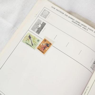 POSTAGE STAMP ALBUM - WITH STAMPS