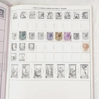 POSTAGE STAMP ALBUM - WITH STAMPS