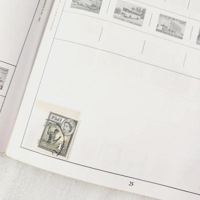 POSTAGE STAMP ALBUM - WITH STAMPS