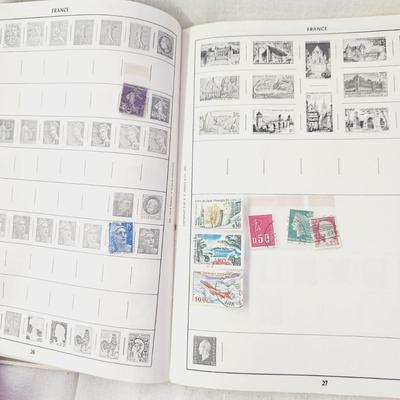 POSTAGE STAMP ALBUM - WITH STAMPS