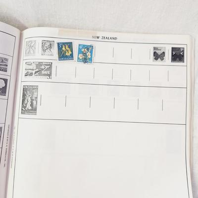 POSTAGE STAMP ALBUM - WITH STAMPS