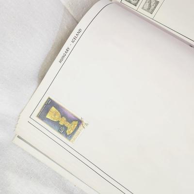 POSTAGE STAMP ALBUM - WITH STAMPS
